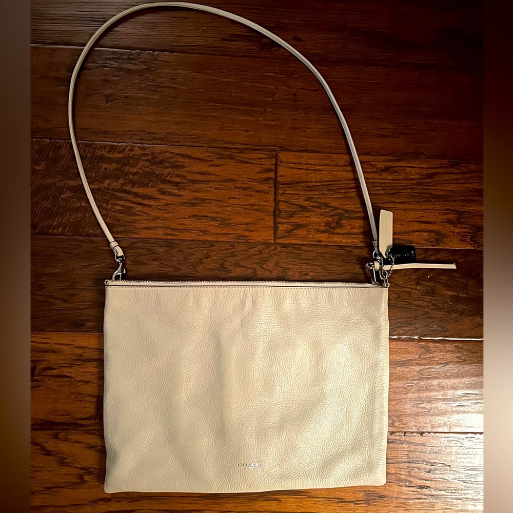 Cream colored Coach clutch/shoulder bag